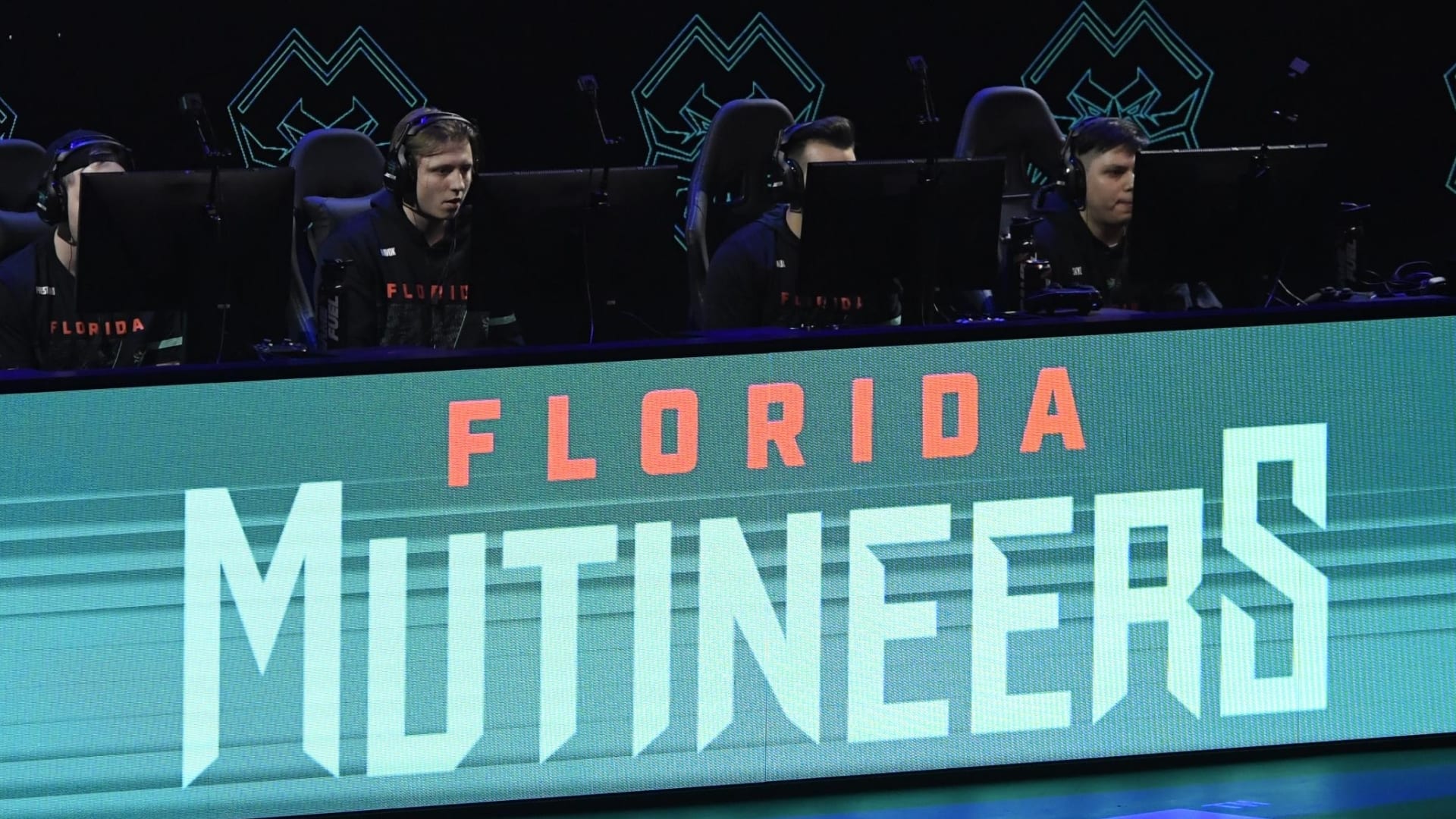 The Florida Mutineers, the host of the next CDL home series, plays a match behind a banner of their name.