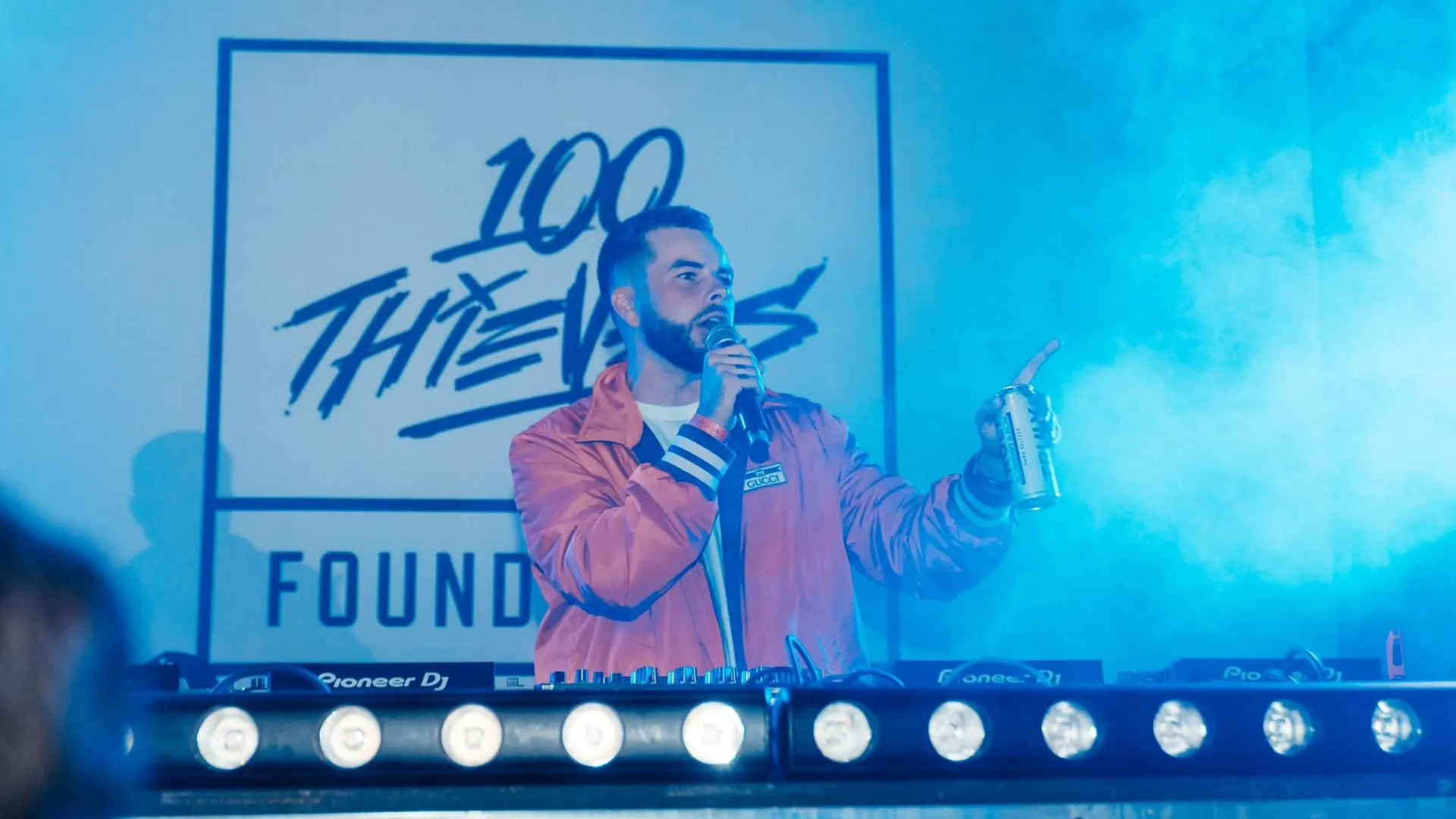 100 Thieves CEO Nadeshot poses in a Gucci jacket before collaboration.