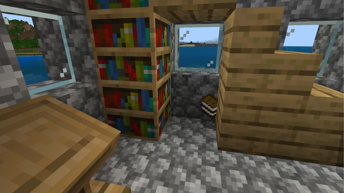 Bookshelves in a village in Minecraft, with books on the ground.