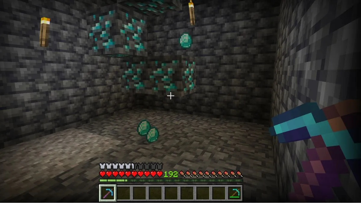 Diamonds dropping from ore after players learns where to find Diamonds in Minecraft.