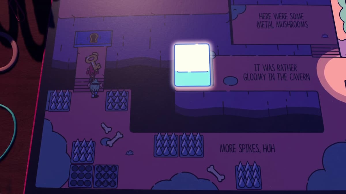 A character holding a giant key stands near a locked door, with spiked traps scattered around in a dimly lit cavern.